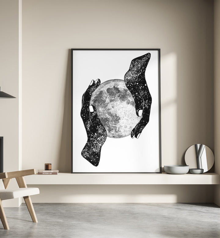 Hands cradling a moon create a stunning focal point in THE MAGIC OF THE UNIVERSE, SURREAL ART PRINTS collection.