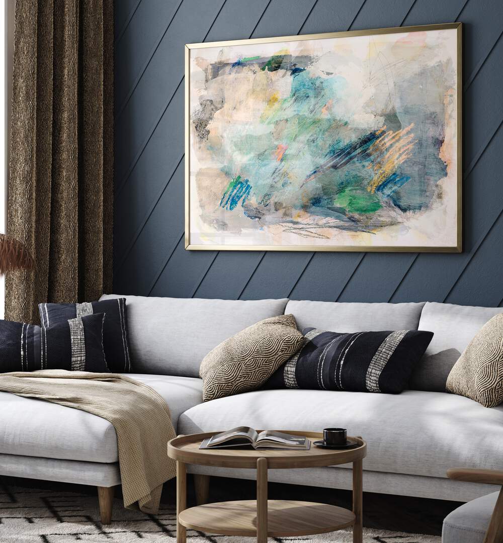 Stylish living room featuring soft pastel hues, abstract paintings that enhance the modern decor aesthetic.
