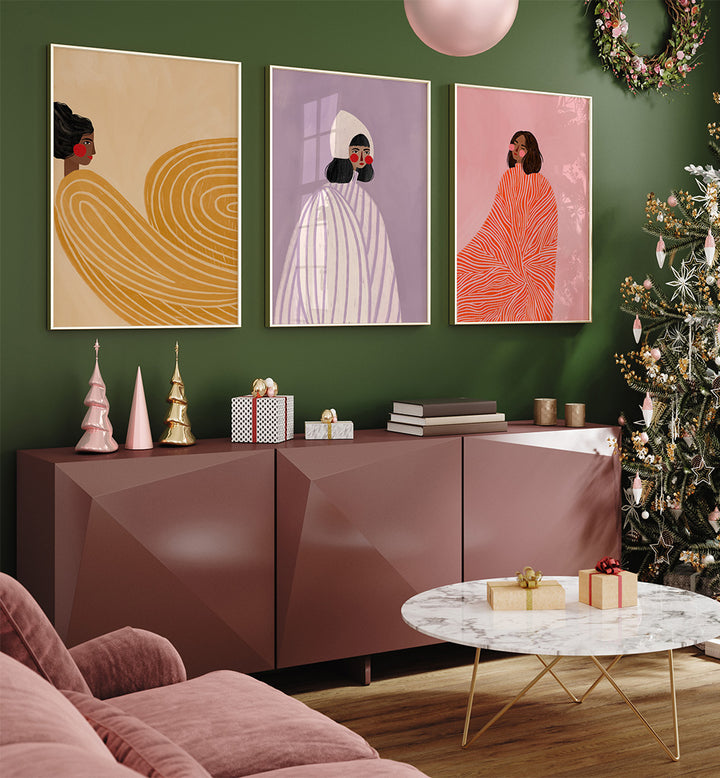 Living room with decorative posters on a green wall, a Christmas tree, and festive decor.