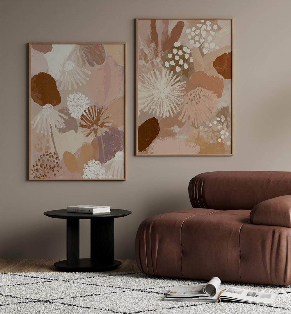 Living room with a brown sofa, black side table, and floral wall art.