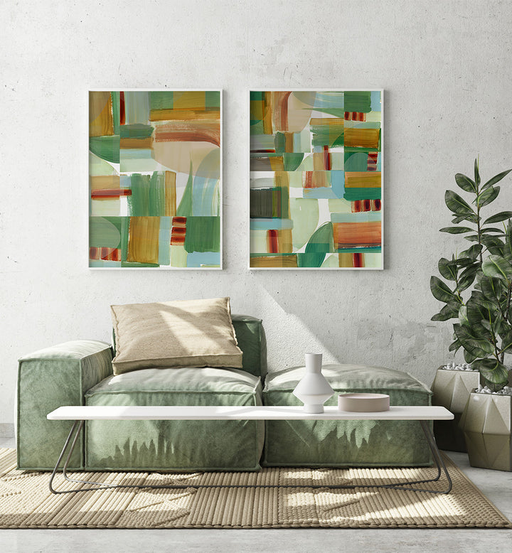 Living room with abstract art on the wall, green sofa, and decorative items.