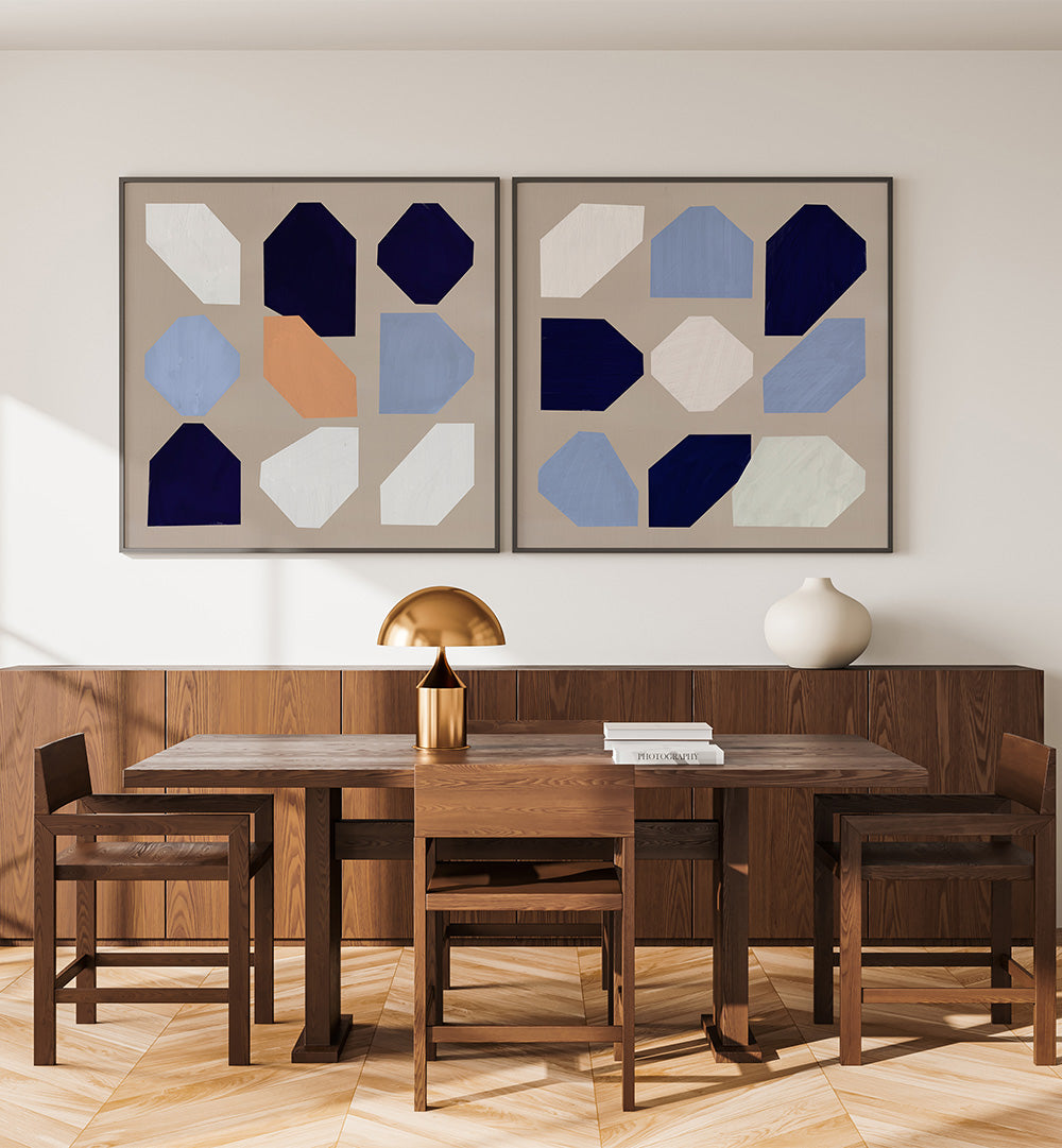 Dining room with wooden table and chairs, abstract art on the wall, and decorative items.