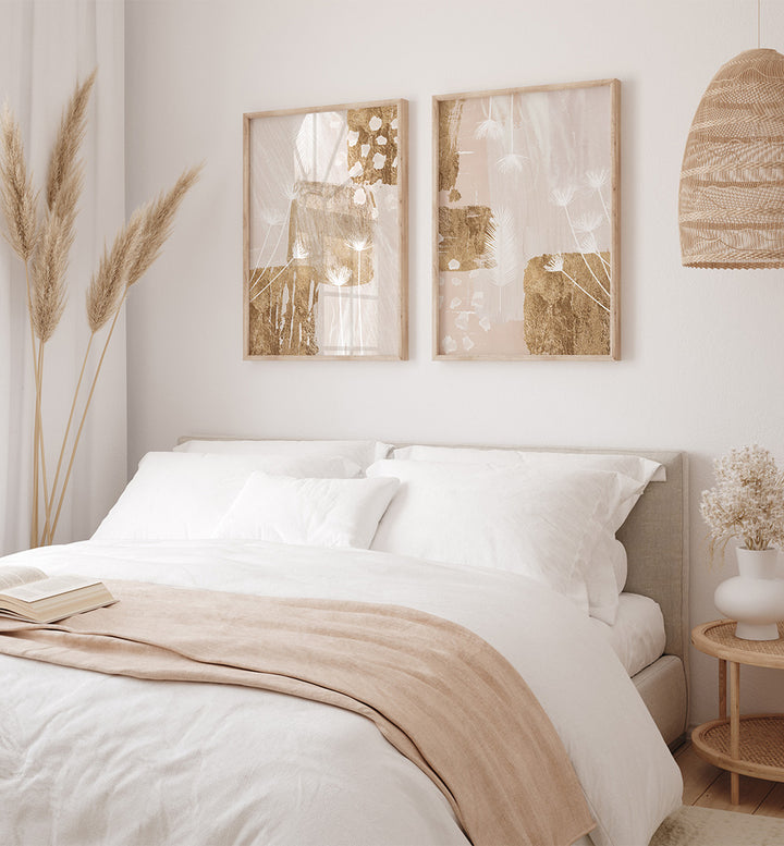 Neatly made bed with beige blanket in a bedroom setting with wall art and decor.
