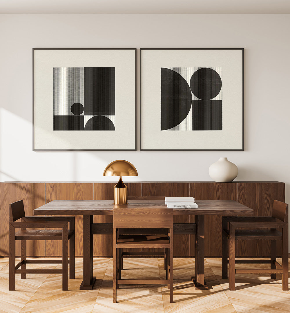 Dining room with wooden table and chairs, abstract art on the wall, and decorative items.