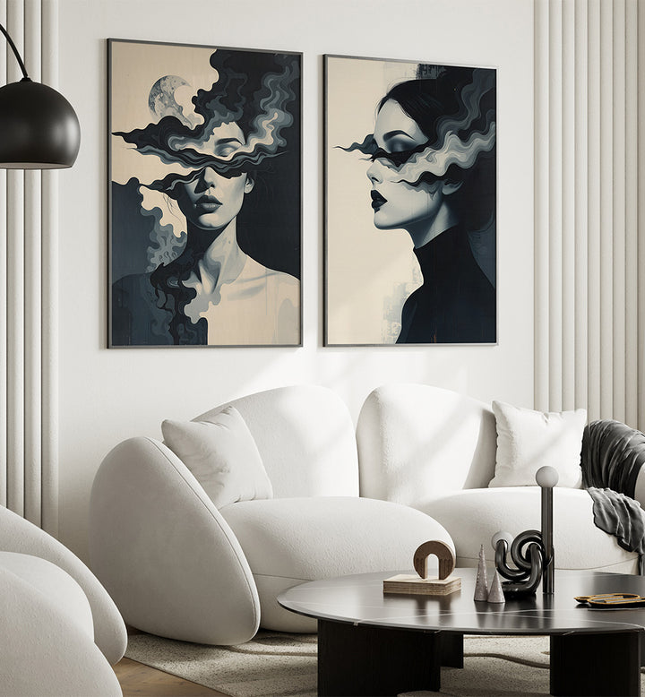 Modern living room with white sofa, coffee table, and abstract art on the wall.