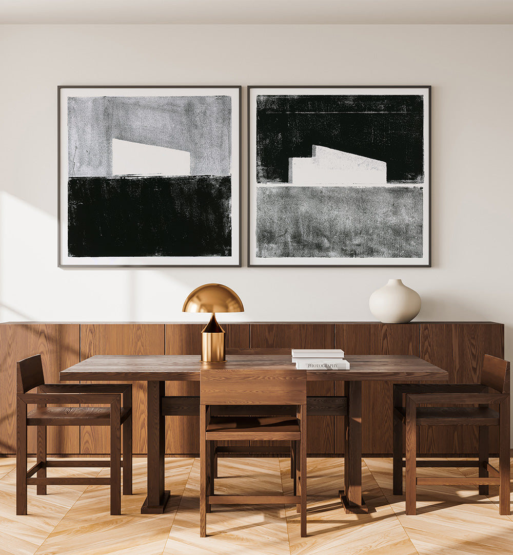 Dining room with wooden table and chairs, abstract art on the wall, and decorative items.