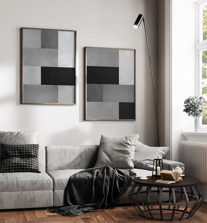 Modern living room with gray sofa, coffee table, and abstract art on the wall.