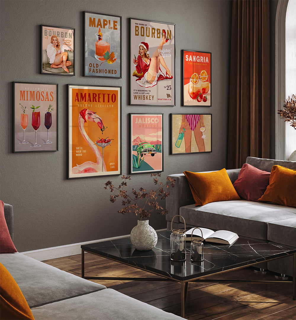 Living room with decorative posters on the wall and a couch with colorful pillows.