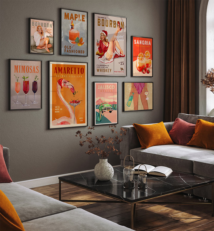 Living room with decorative posters on the wall and a couch with colorful pillows.