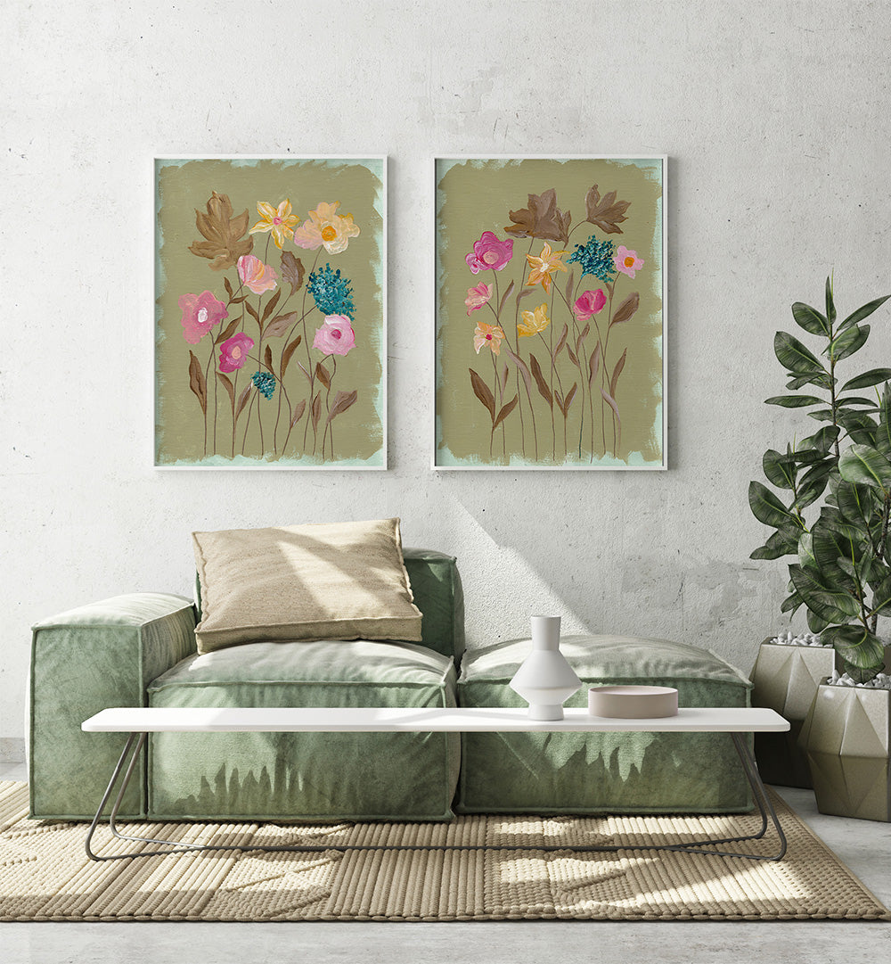 Living room with green sofa, white coffee table, and floral wall art.