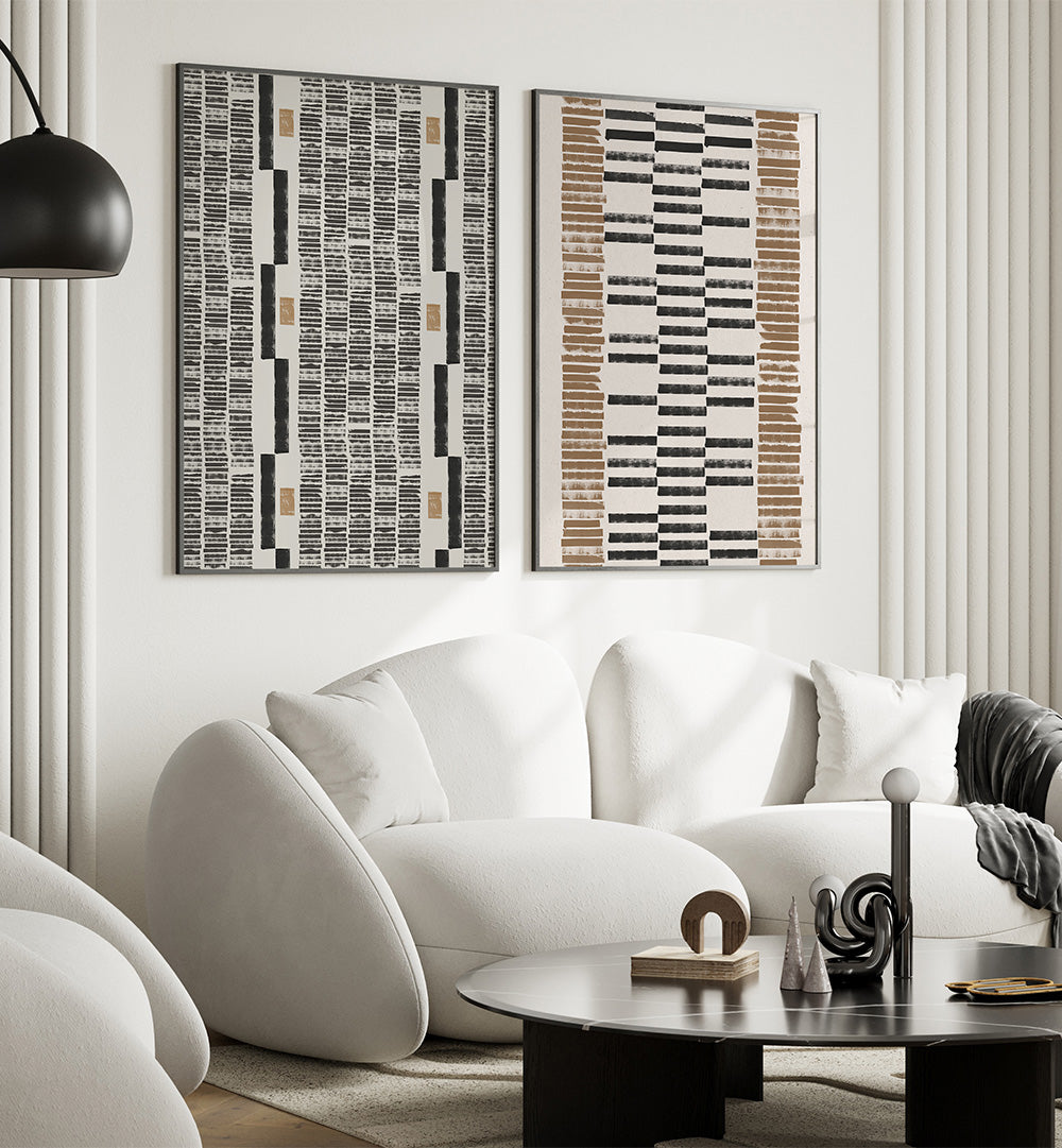 Modern living room with white sofa, abstract art, and a coffee table.