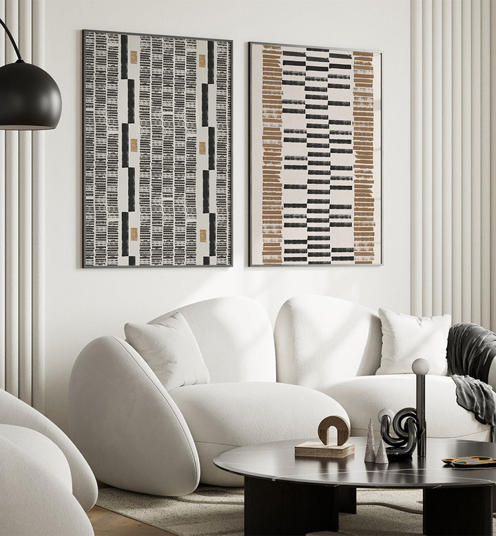 Modern living room with white sofa, abstract art, and a coffee table.