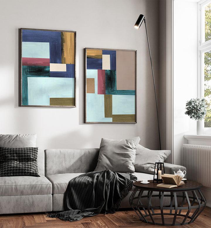 Modern living room with abstract art on the wall and a sofa.