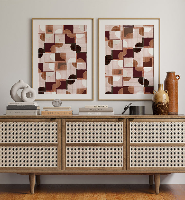 Wooden cabinet with decorative items and abstract wall art in a room.