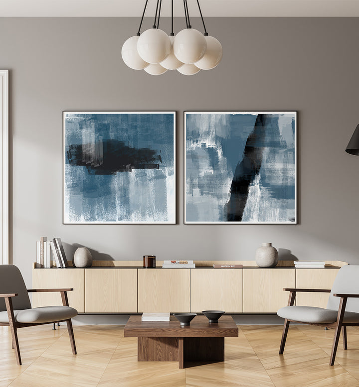 Modern living room with abstract art on the wall and a wooden coffee table.