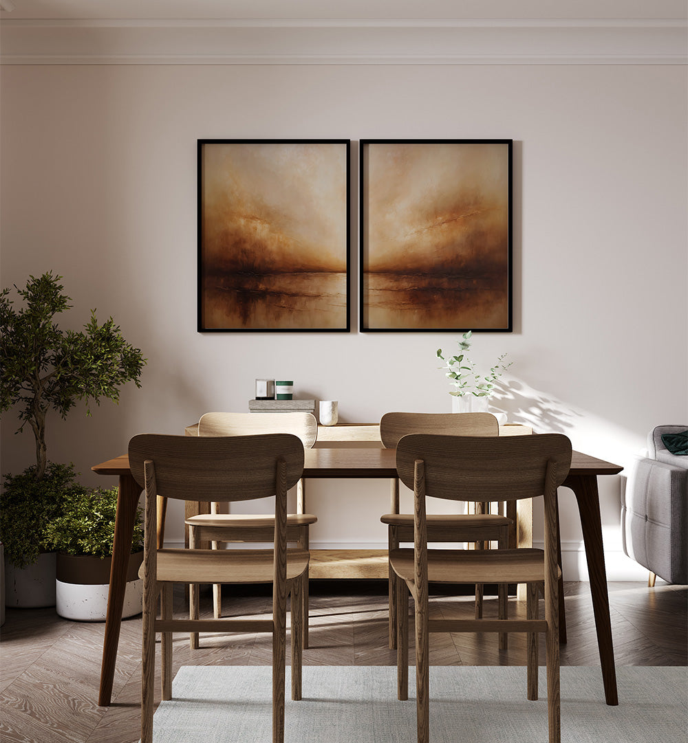 Dining room with wooden table and chairs, and two framed artworks on the wall.