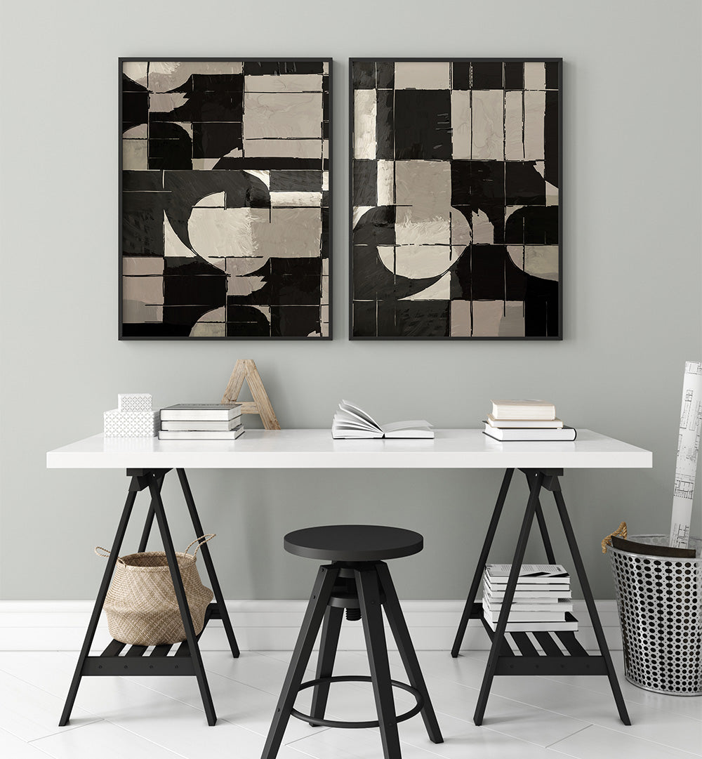 Modern interior with a white desk, black stool, and abstract wall art.