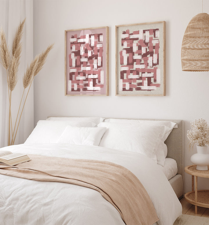 Neatly made bed with white bedding and beige blanket in a bedroom setting.