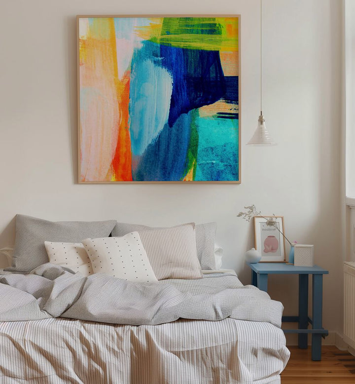 Vibrant TROPICAL HEAT I, ABSTRACT PAINTINGS adorns a cozy bedroom, enhancing the space with bold colors.