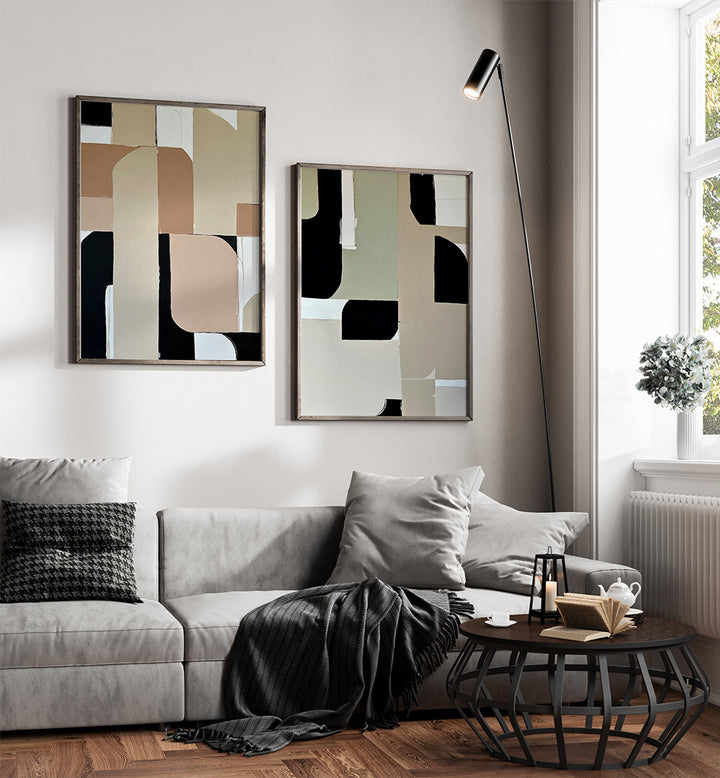 Modern living room with abstract art, gray sofa, and coffee table.