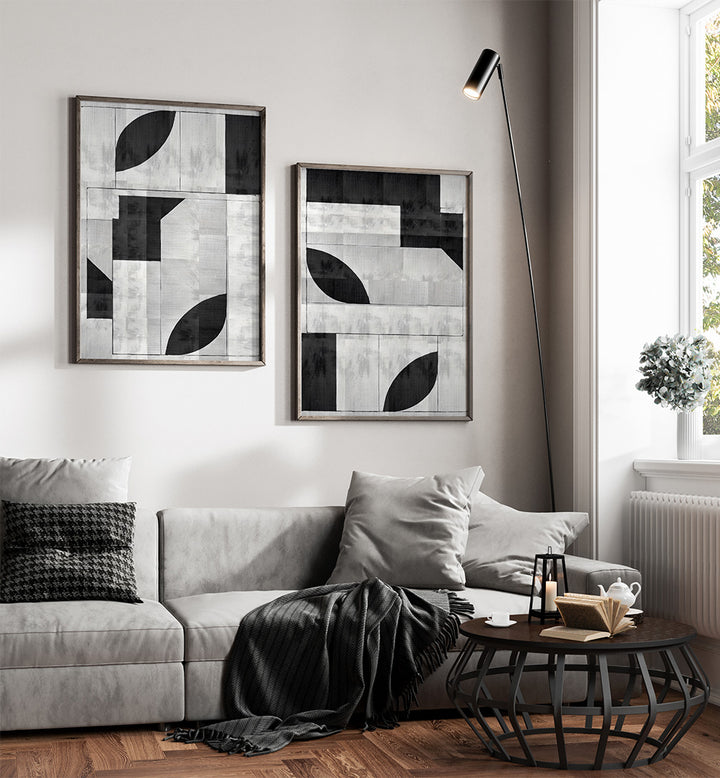 Modern living room with abstract art, sofa, and coffee table.