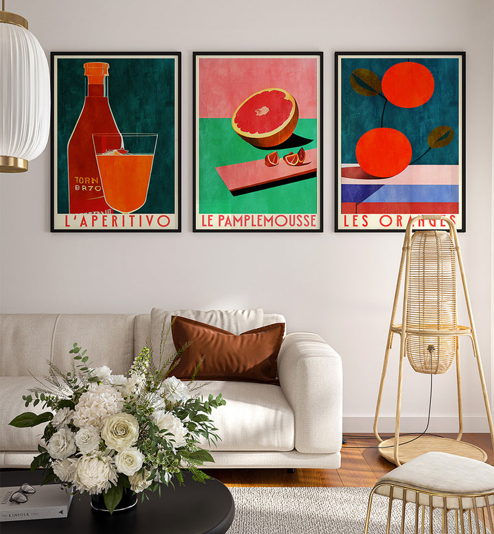 Modern living room with colorful abstract art prints on the wall.