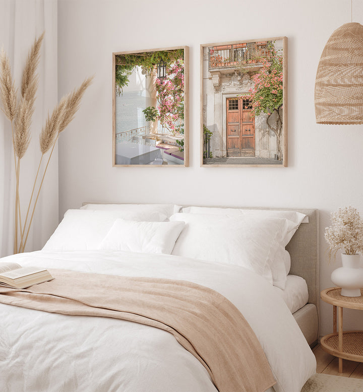 Neatly made bed with white bedding and beige blanket in a bedroom setting.