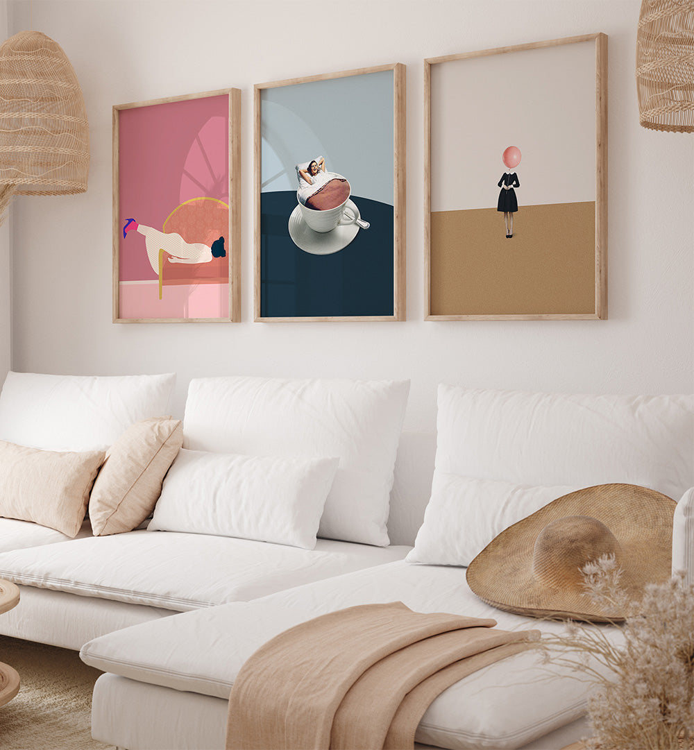 Modern living room with a white sofa, abstract art on the wall, and decorative elements.