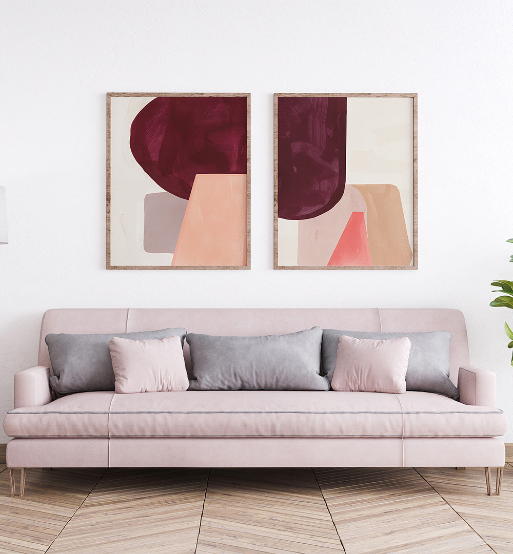 Living room with a pink sofa and abstract art on the wall