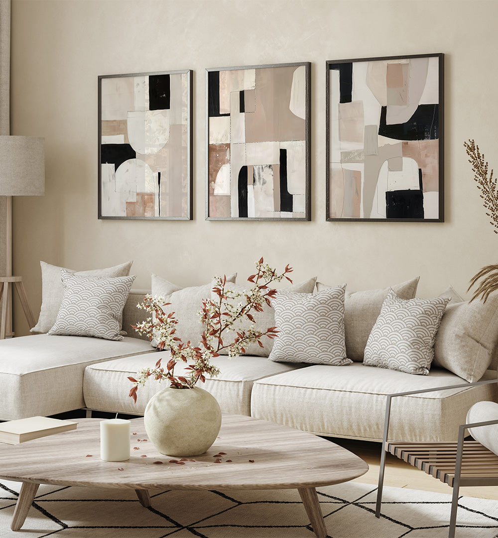 Modern living room with a sectional sofa, abstract art, and decorative elements.