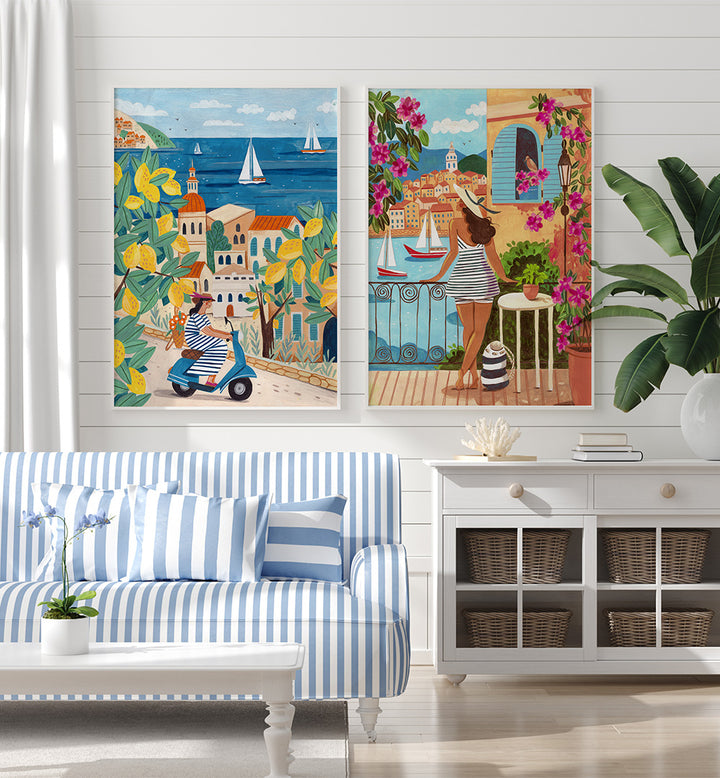 Living room with a blue and white striped sofa, decorative wall art, and a white cabinet.