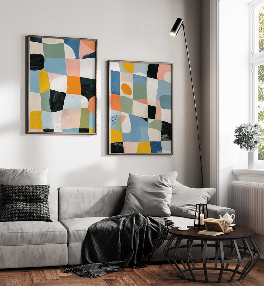 Living room with abstract art on the wall, a gray sofa, and a coffee table.
