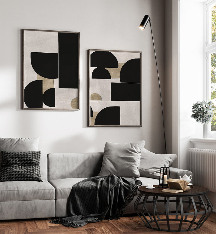 Modern living room with abstract art, sofa, and coffee table.
