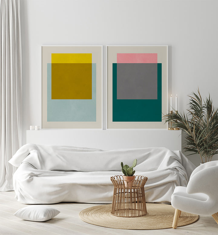 Modern living room with abstract art on the wall and a white sofa.