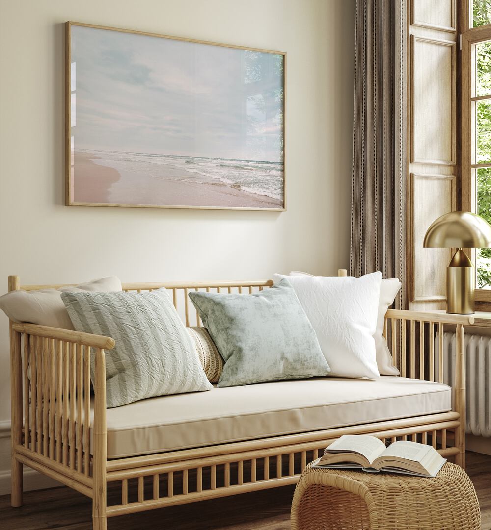 Serene living room featuring "AT THE COAST, BEACH PAINTINGS" on the wall, perfect for coastal decor enthusiasts.