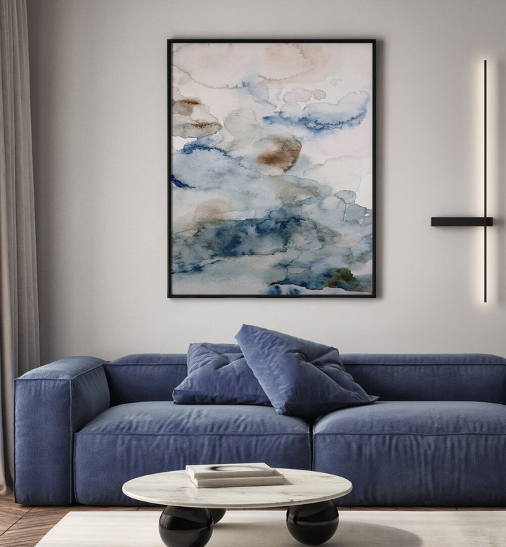 Stylish living room featuring "UP IN THE CLOUDS IV, ABSTRACT PAINTINGS" framed above a blue couch for artistic elegance.