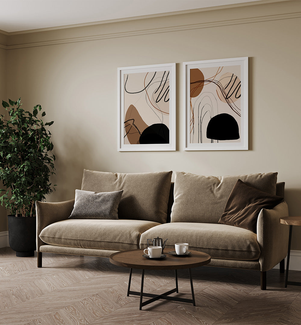 Living room with a beige sofa, abstract art on the wall, and a coffee table.