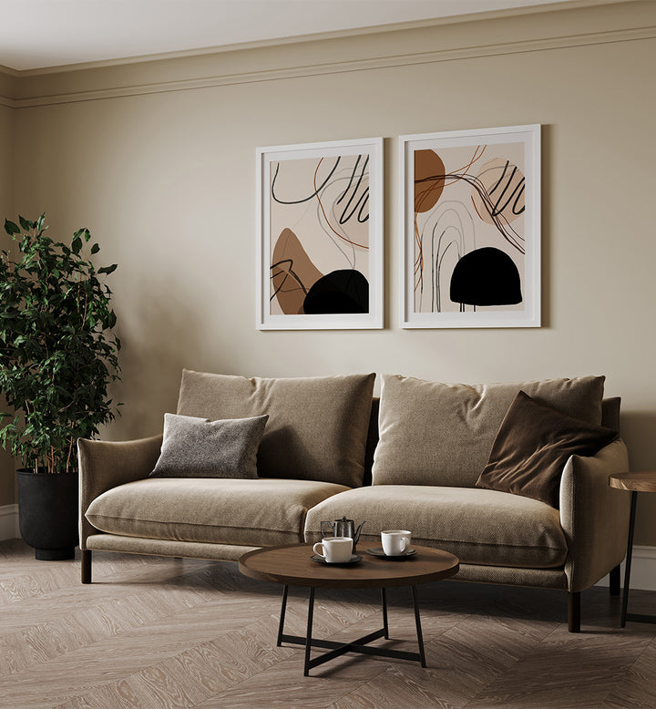 Living room with a beige sofa, abstract art on the wall, and a coffee table.