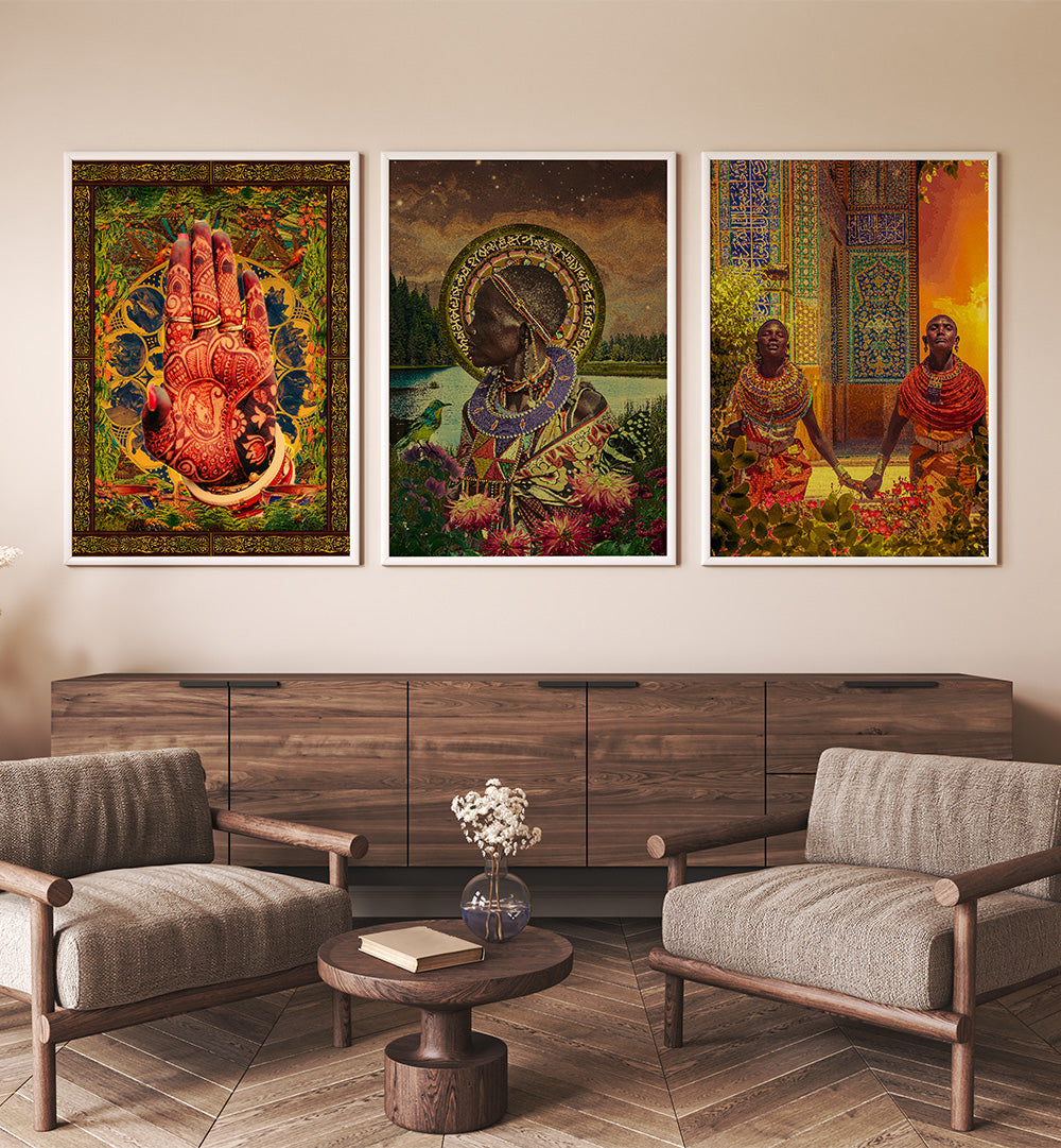 Three framed artworks on a wall above a wooden cabinet in a living room.