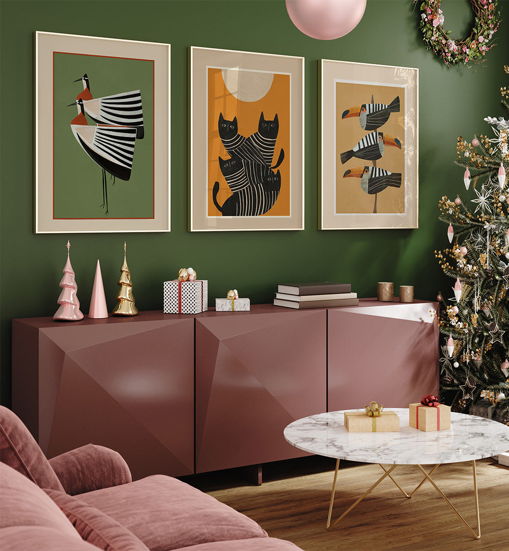 Living room with decorative wall art, furniture, and a Christmas tree.