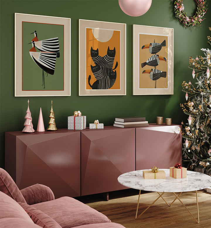 Living room with decorative wall art, furniture, and a Christmas tree.