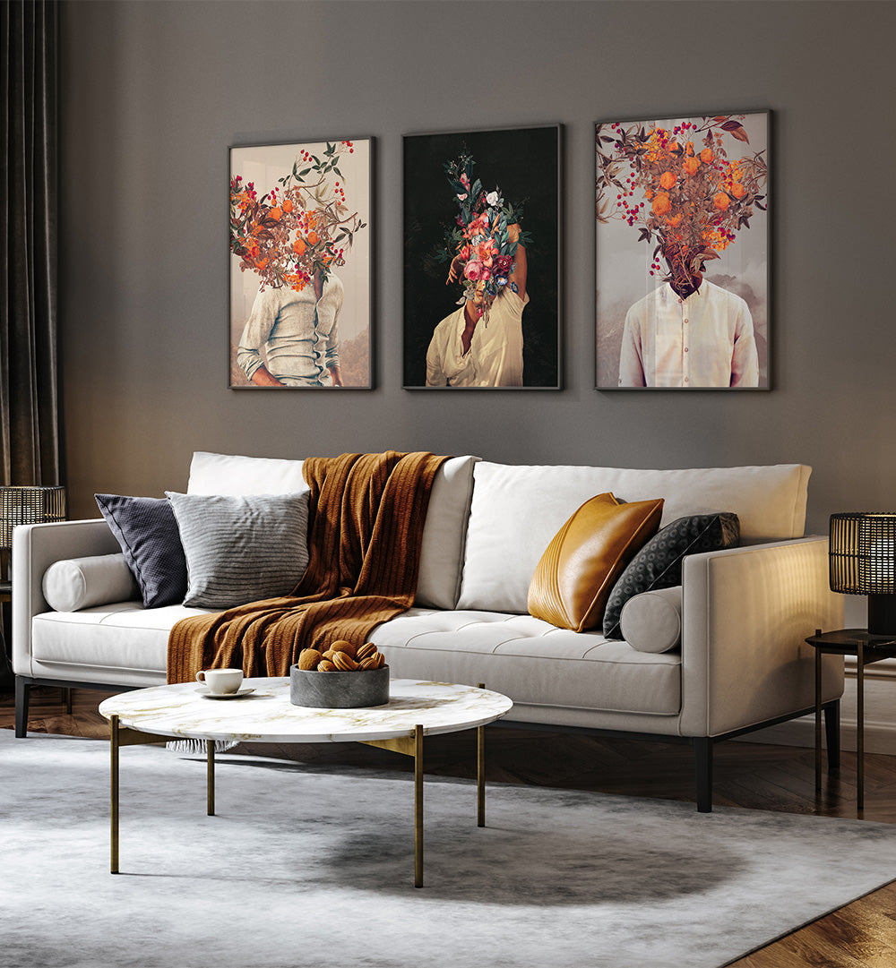 Modern living room with a white sofa, decorative pillows, and wall art.