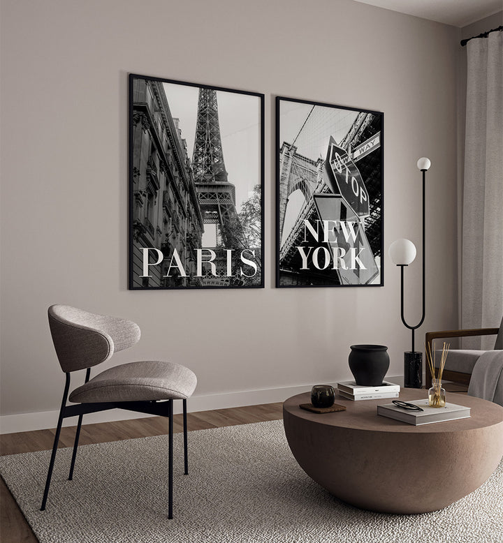Living room with 'New York' and 'Paris' wall art above a coffee table.
