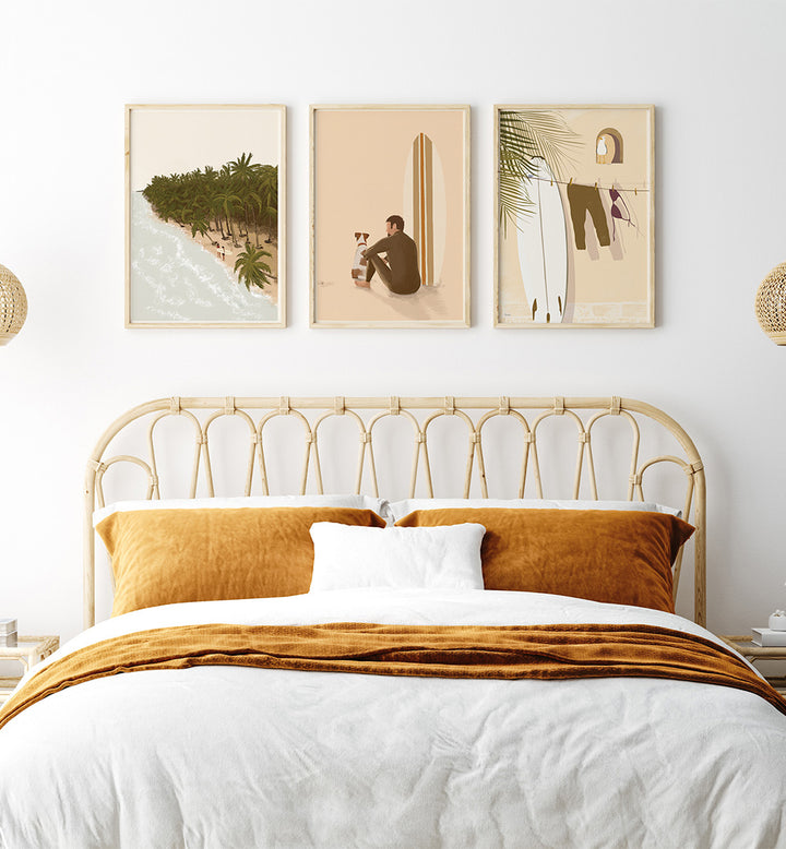 Bedroom with gold headboard, mustard pillows, and wall art depicting nature and people.