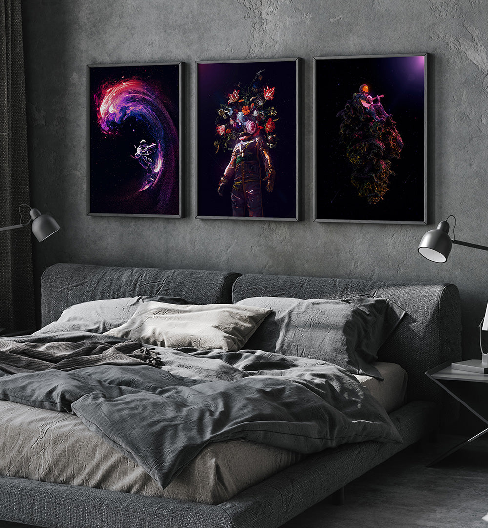 Three abstract wall art pieces above a bed in a bedroom setting.