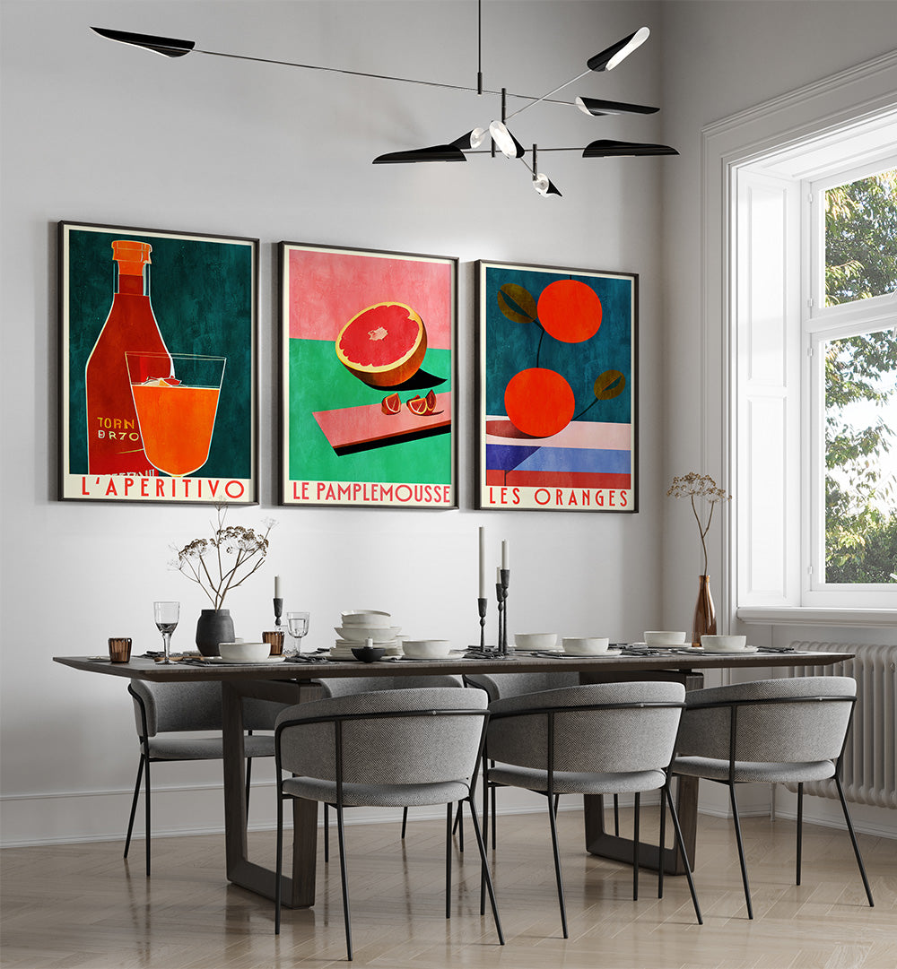 Dining room with a table and chairs, featuring colorful abstract art on the wall.