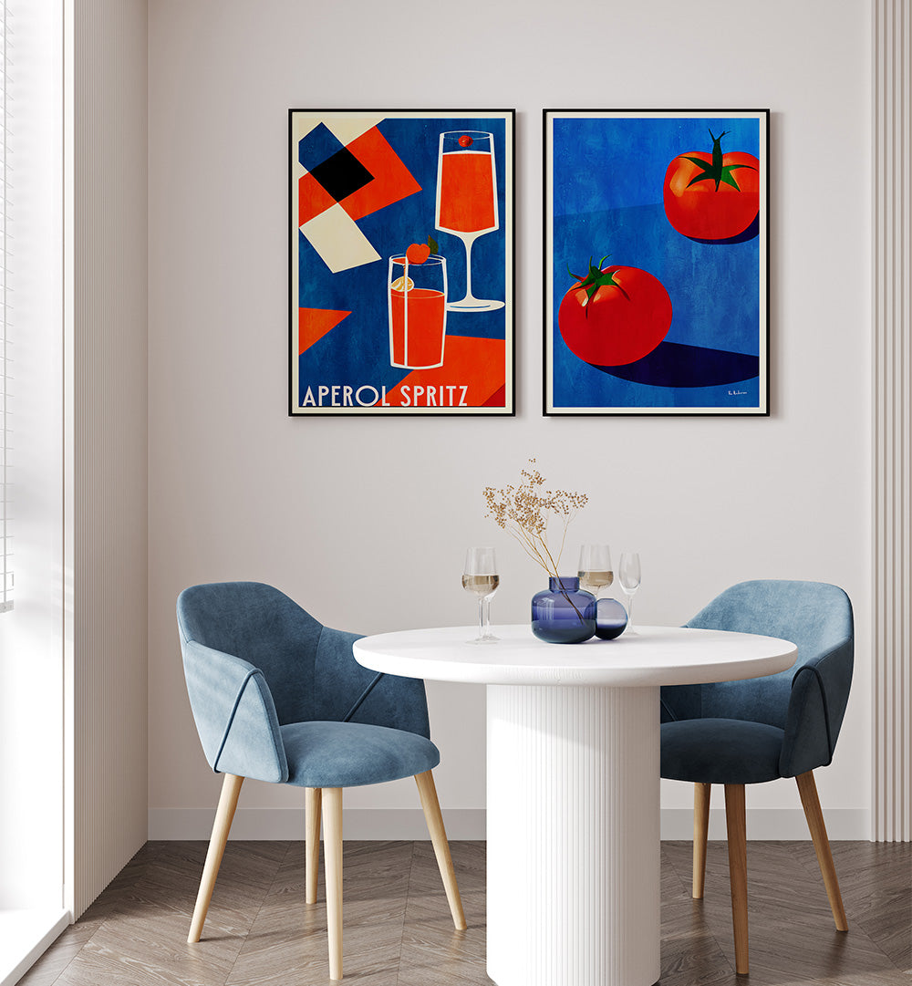 Dining area with blue chairs, white table, and colorful wall art in a room.