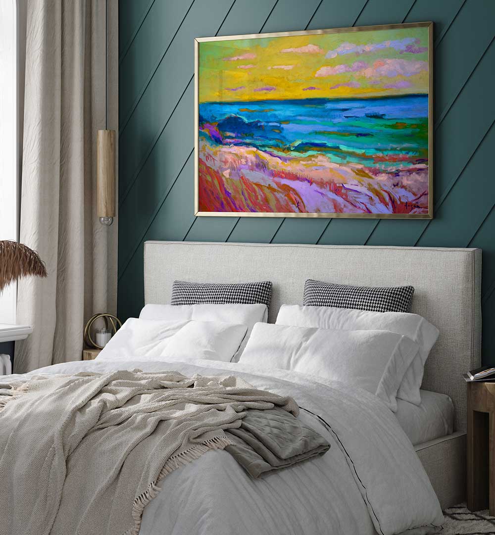 Framed COASTAL  SUNSET , LANDSCAPE PAINTINGS on bedroom wall showing vibrant sea, dunes, and golden twilight