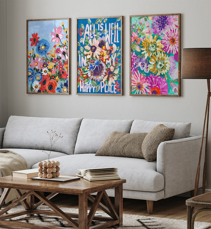 Living room with a gray sofa, wooden coffee table, and colorful floral wall art.