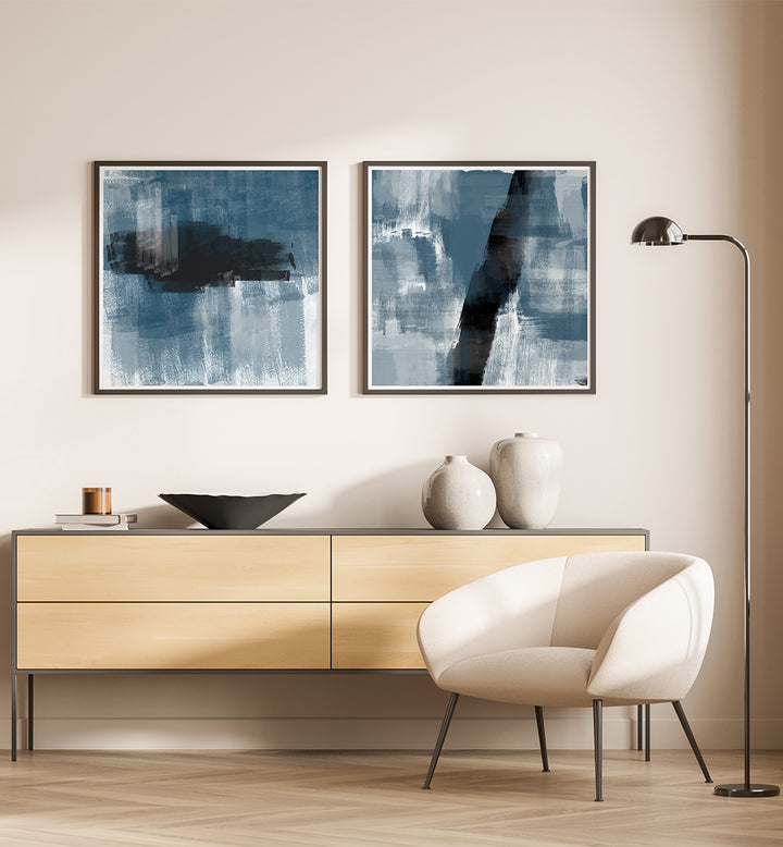 Modern living room with abstract art, furniture, and decor.